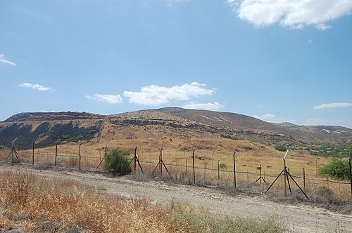 panorama of Tel Dover, which is the hill just behind the fence