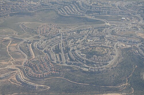 aerial panorama of Ras et Tawil, which is on the summit of the hill at center right